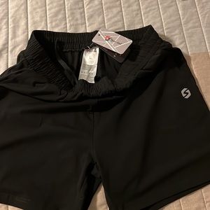 New (SpoWind) Unisex shorts L Junior